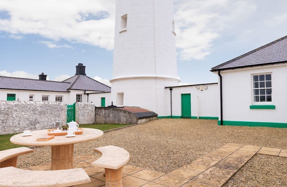 Ariel, Nash Point Lighthouse:  Fully enclosed garden with stone garden furniture