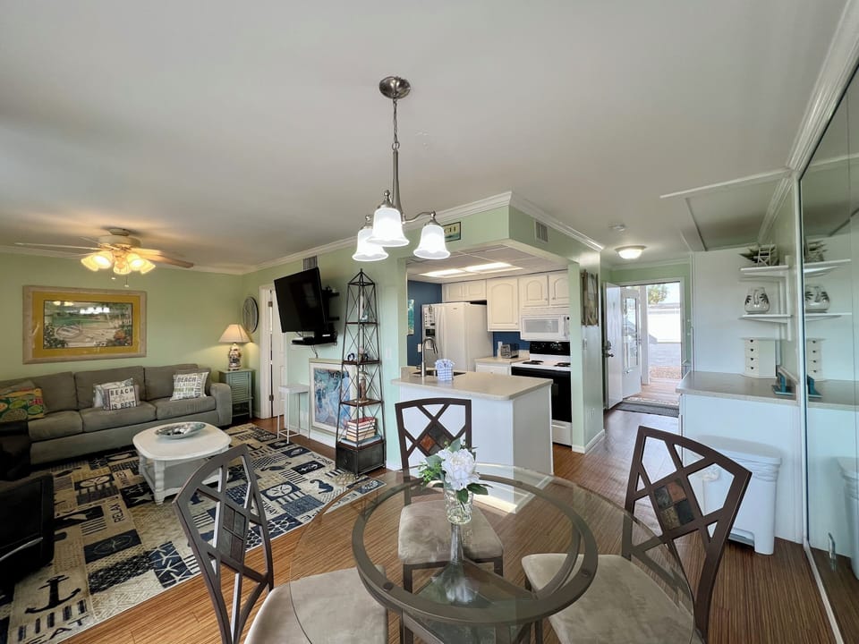 Your bright, open-concept space flows from cozy living room to modern kitchen, perfect for relaxing and entertaining during your stay.