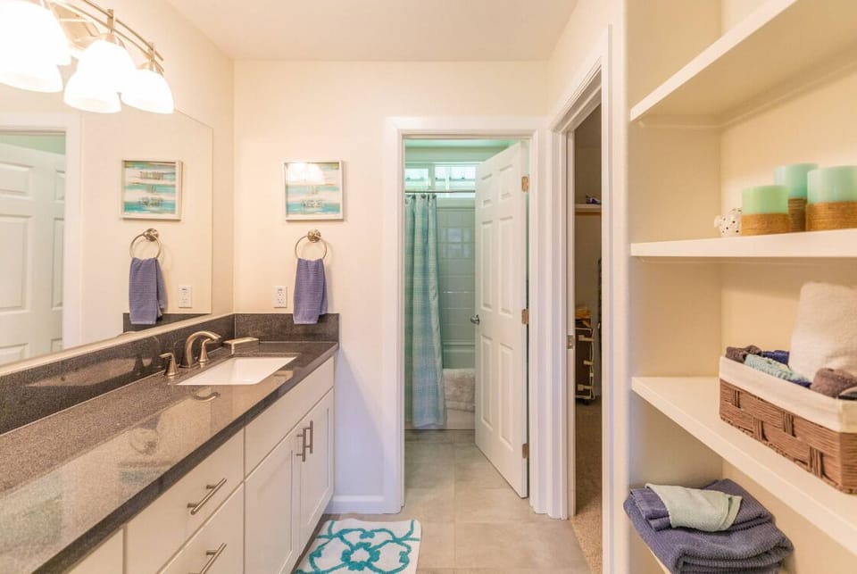 Ocean Themed Master Bathroom.  Walk in Closet