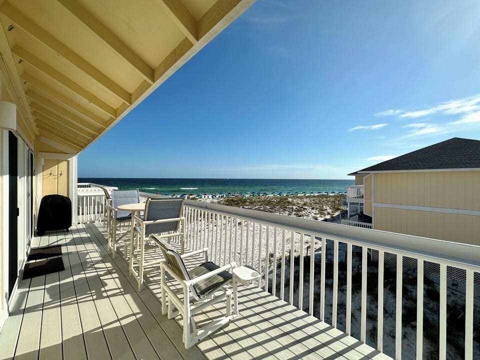 Relax on your private balcony with stunning ocean views and comfortable seating, perfect for morning coffee or sunset cocktails.