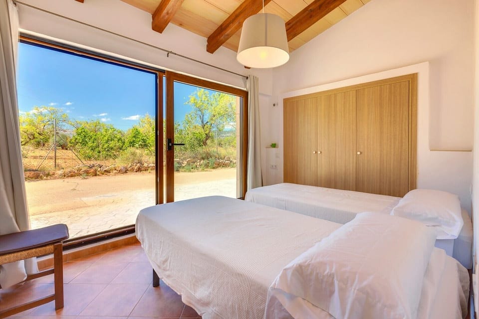 Villa Calvia's bedroom with garden views