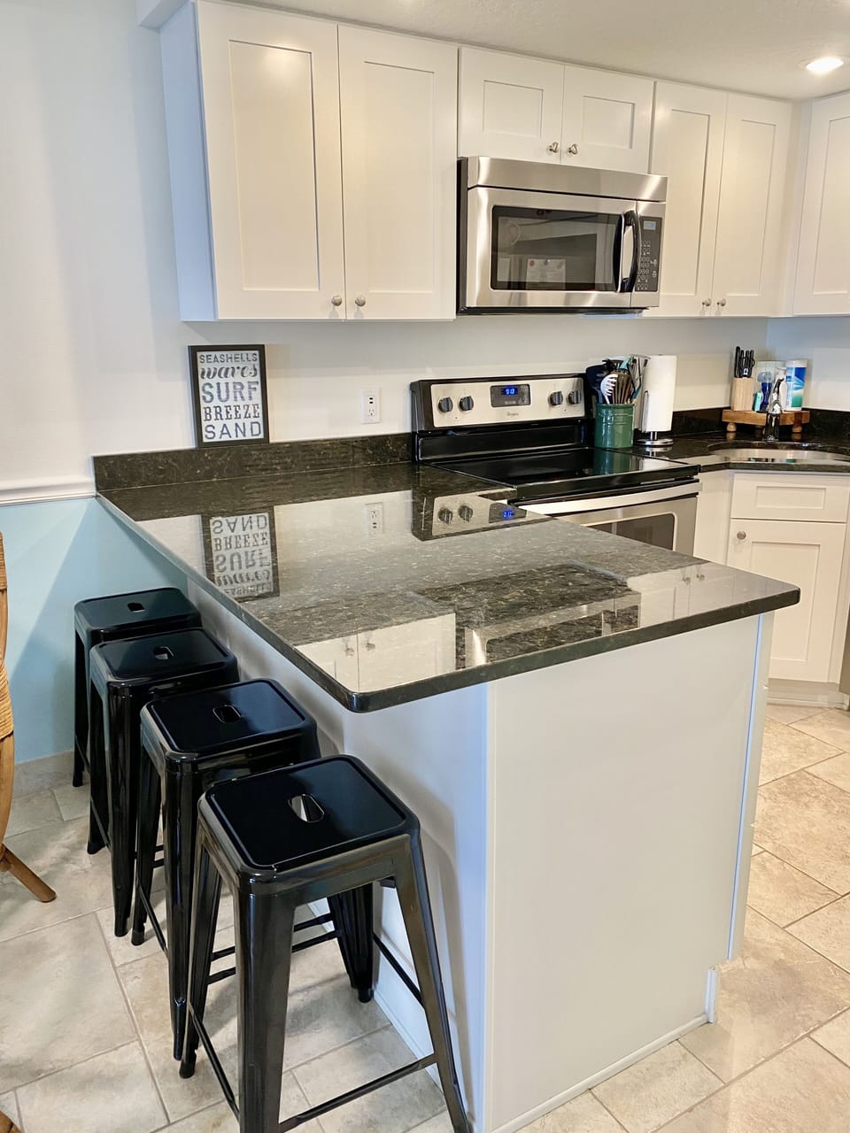 Seating with bar stools, so easy to clean up quick meals for kids! 
