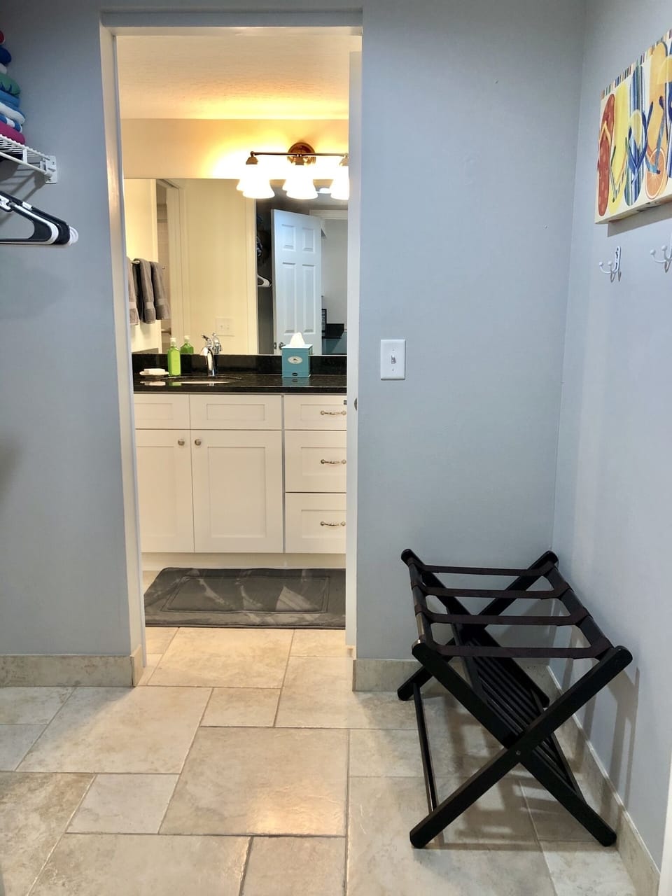 Walk thru closet allows for others to use bathroom without entering bedroom 