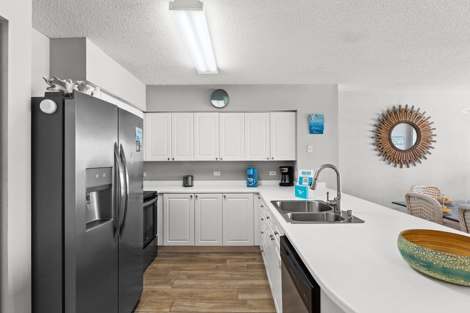 Kitchen - Kitchen features beautiful stainless steel appliances, ample cabinets and counter space.
The Chef of the group can enjoy gorgeous Gulf views while prepping those meals.