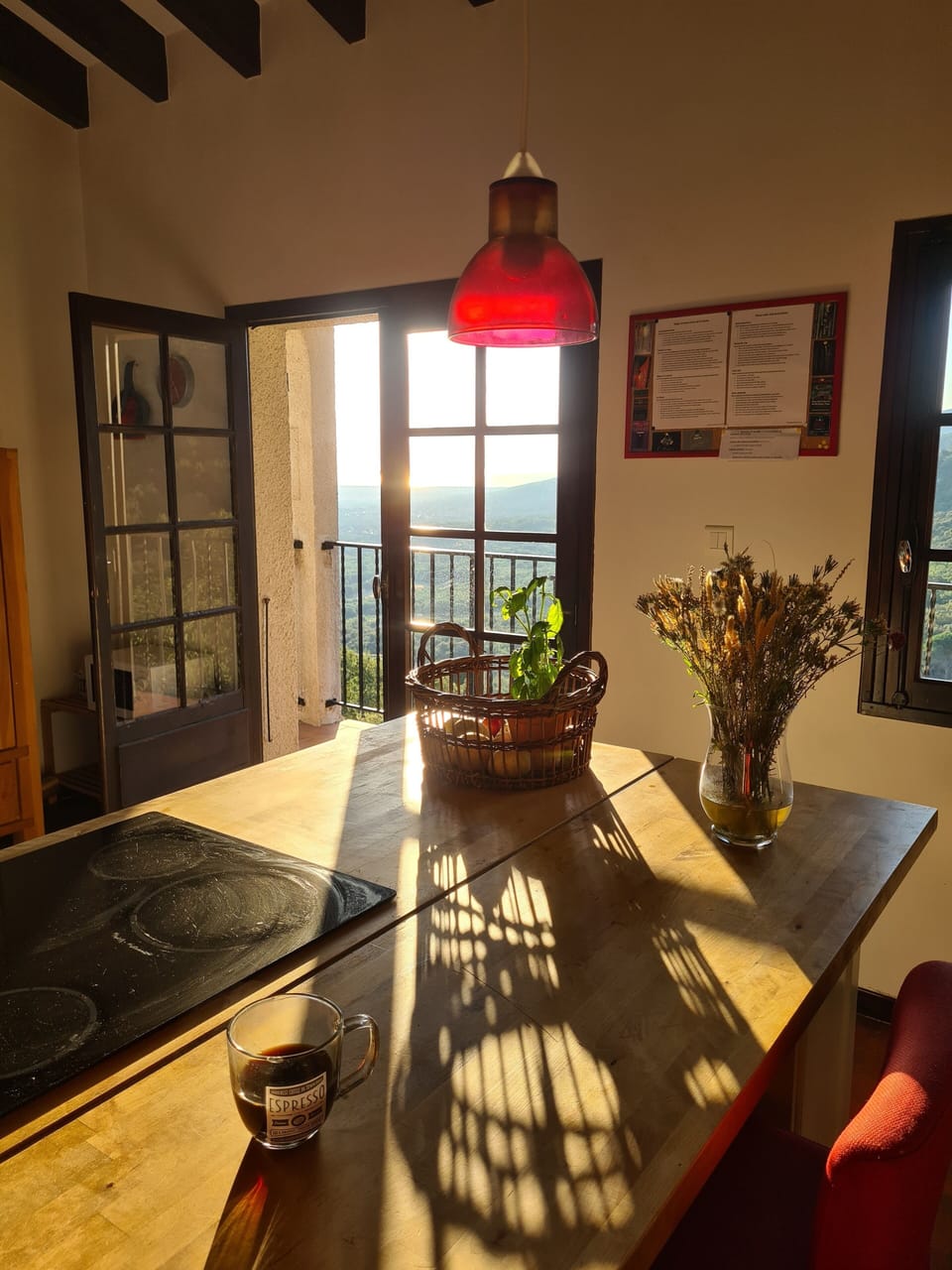 Coffee at the kitchen desk in the morning with a view to the sea