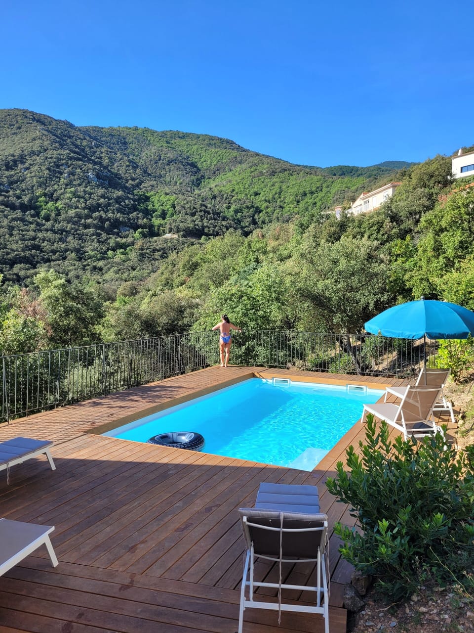 Pool and terrace with a view up the mountain