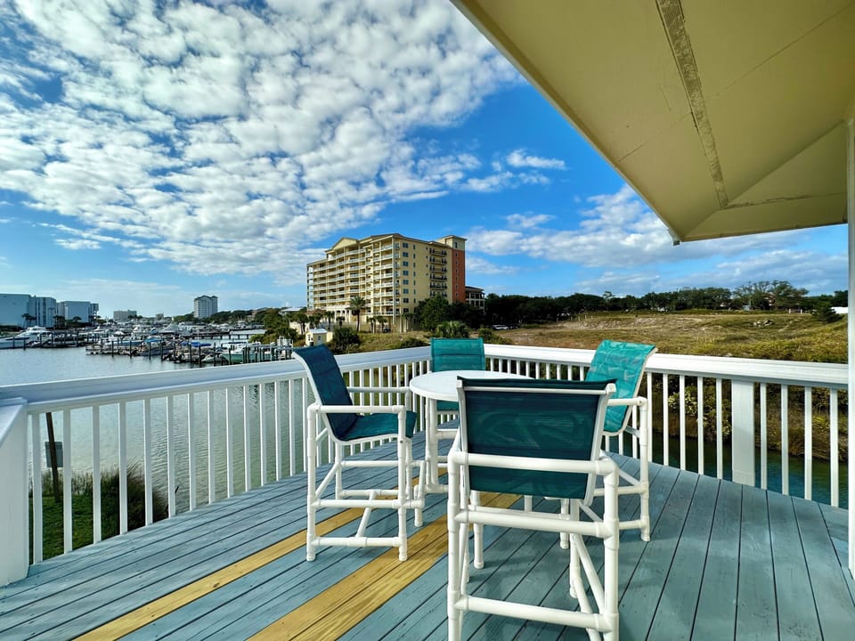 Sip your morning coffee on this waterfront deck, watching boats glide by as you plan your coastal adventures.