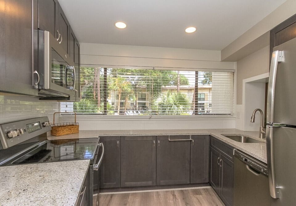 Kitchen - • Kitchen : Coffee Maker, Cookware, Full Kitchen, Microwave, Refrigerator, Dishwasher, Stove.