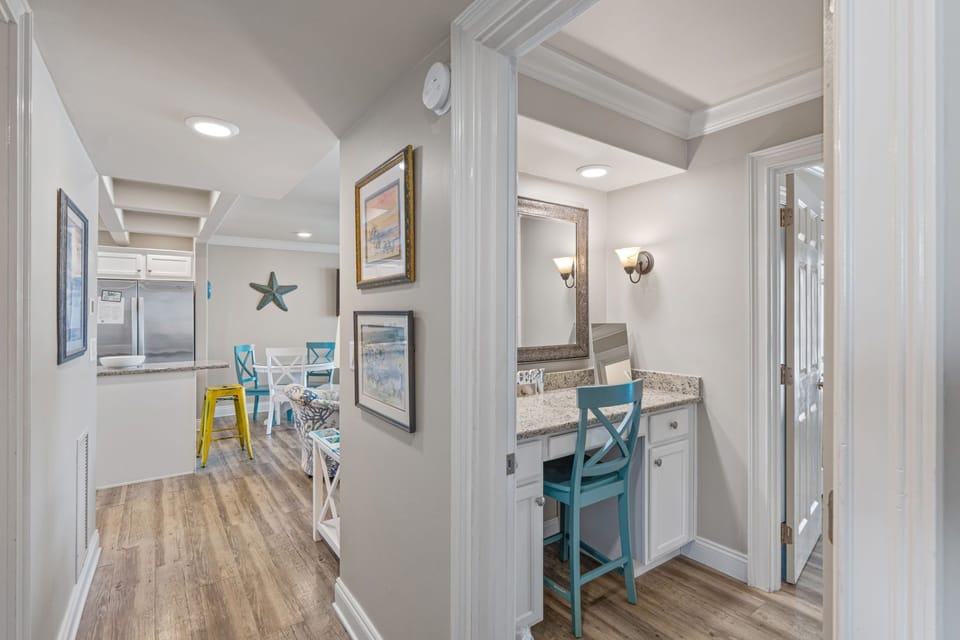 Step inside and feel instantly at home in this bright, thoughtfully designed space. Your own stylish vanity area offers a perfect spot to prepare for the day, while coastal-inspired touches throughout create a relaxing beach getaway atmosphere.
