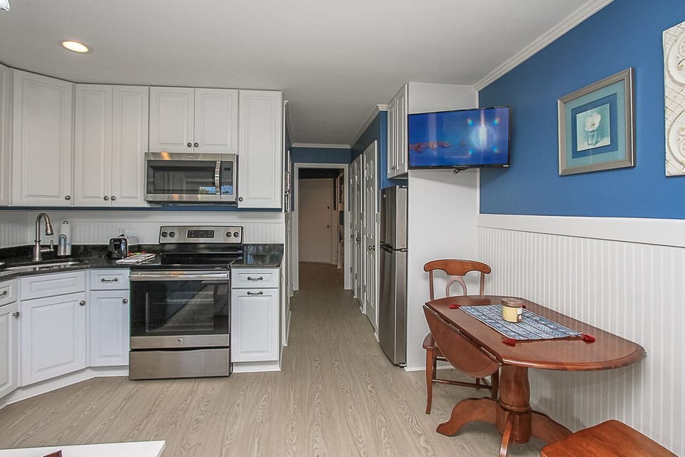 Seaside Villas - 232 - Looking from Balcony into Villa - Newly renovated condo with all new furnishings, flooring, cabinetry and appliances.