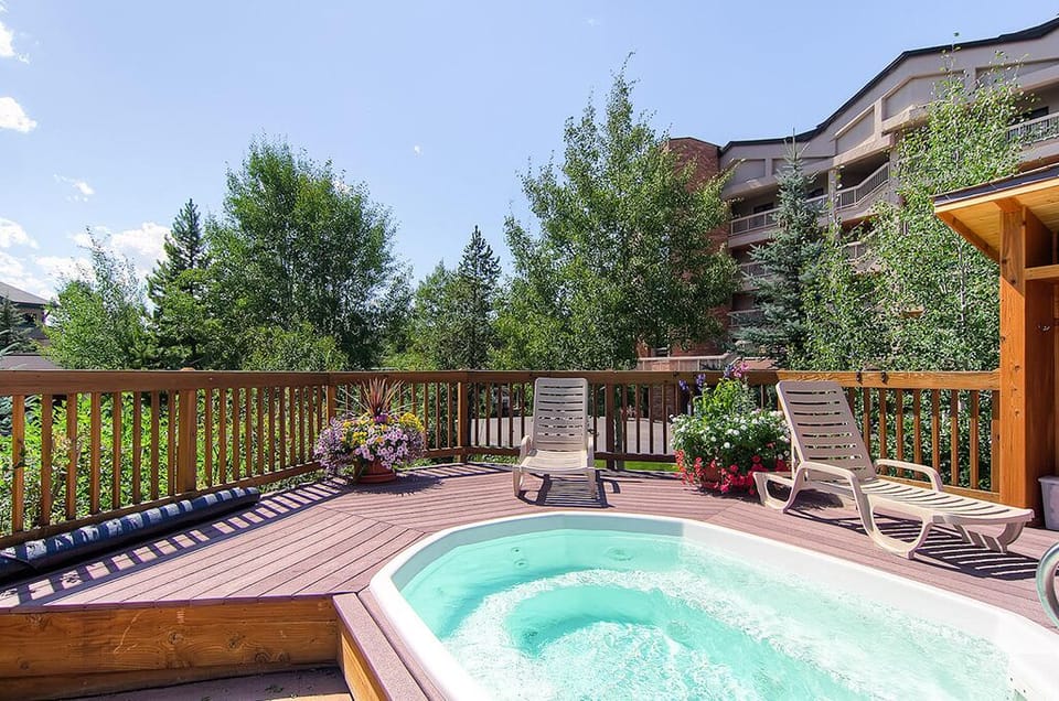 Soak in your private hot tub surrounded by lush greenery, where warm bubbles and mountain air create the perfect retreat.