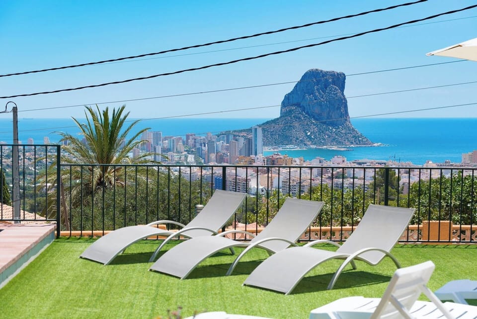 Pleasant holiday villa with private pool and stunning sea views, located in Calpe (COSTA BLANCA) for 8 people. The villa has four bedrooms and three bathrooms distributed over two floors.INTERIOR: This beautiful villa has air conditioning, is composed of two floors connected by external stairs. On the GROUND FLOOR, we will find a bedroom with two single beds and an en suite bathroom with shower. The UPPER FLOOR, consists of a large covered terrace with views of the sea and the pool, with access to living room with Sat / Tdt TV, well-equipped independent kitchen, with mixed kitchen (gas and electric), three large bedrooms (two of them with two single beds in each and one with double bed and en suite bathroom with shower) and finally, a bathroom with bathtub.EXTERIOR: Large closed and wooded plot with pool area with spectacular views where you can enjoy the sun and delicious barbecues. Pool 8X4 (min. 1.10m and max. 1.70m). Parking for 2-3 cars.LOCATION: Enjoy the tranquility just one step away from all services: only 2km separate it from the center of Calpe and its supermarkets and 2.5km from the sandy beaches.OBSERVATIONS: Wifi included. Pets are allowed up to 12kg with supplement.