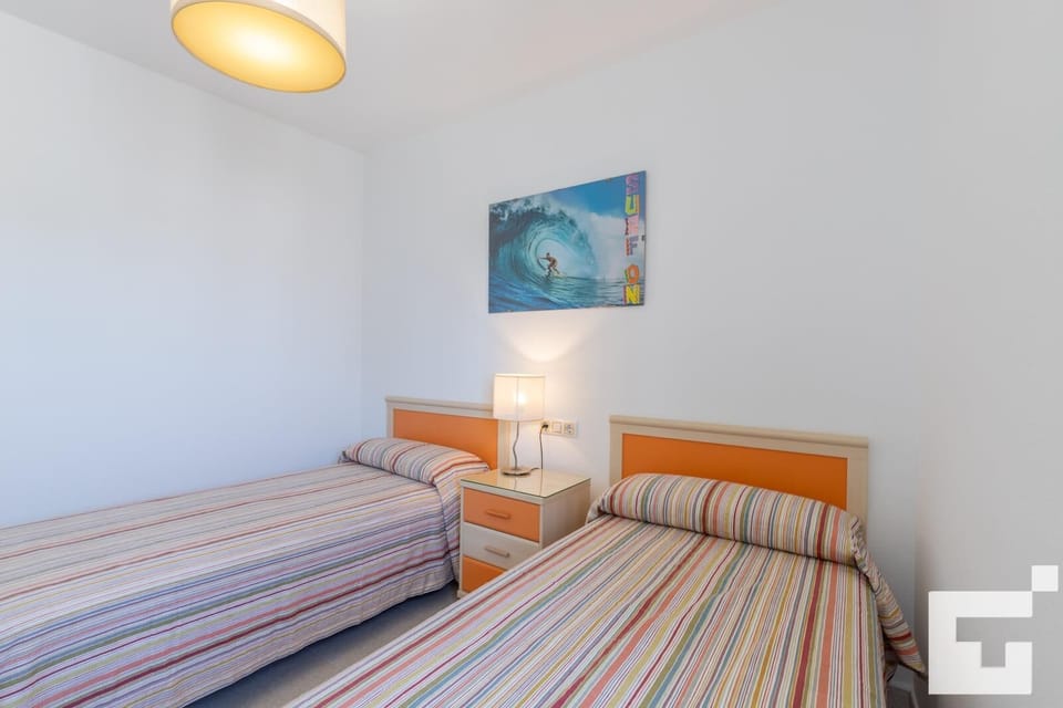 Bedroom with two single beds