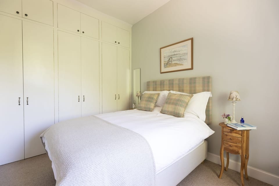 The Heritage - bedroom one with double bed