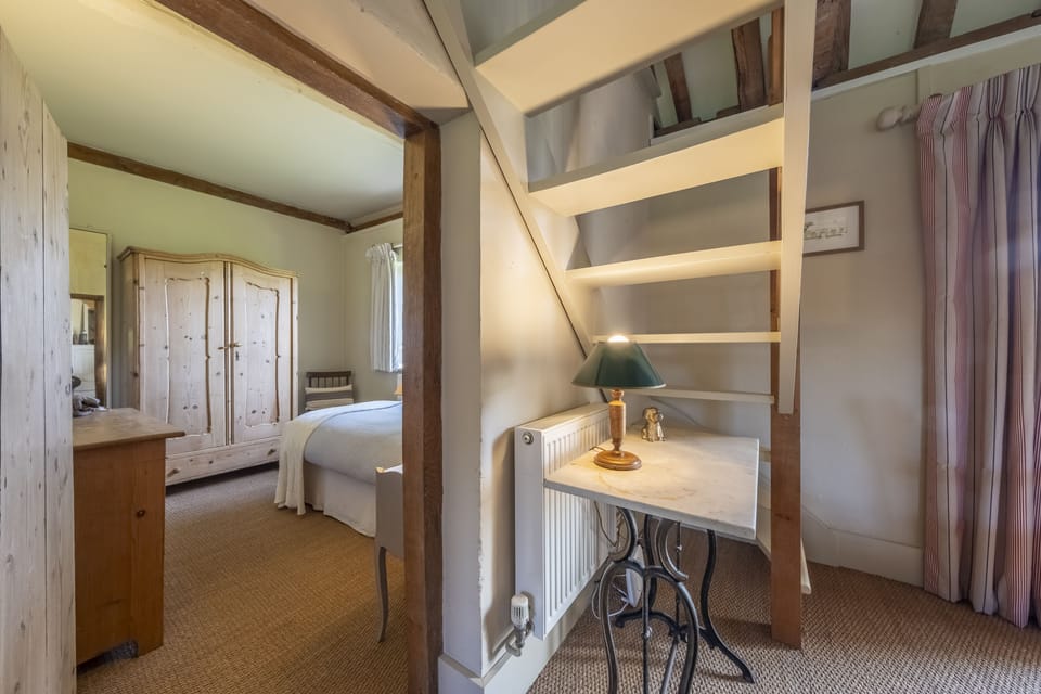 Sitting room leading to the dressing room and bathroom