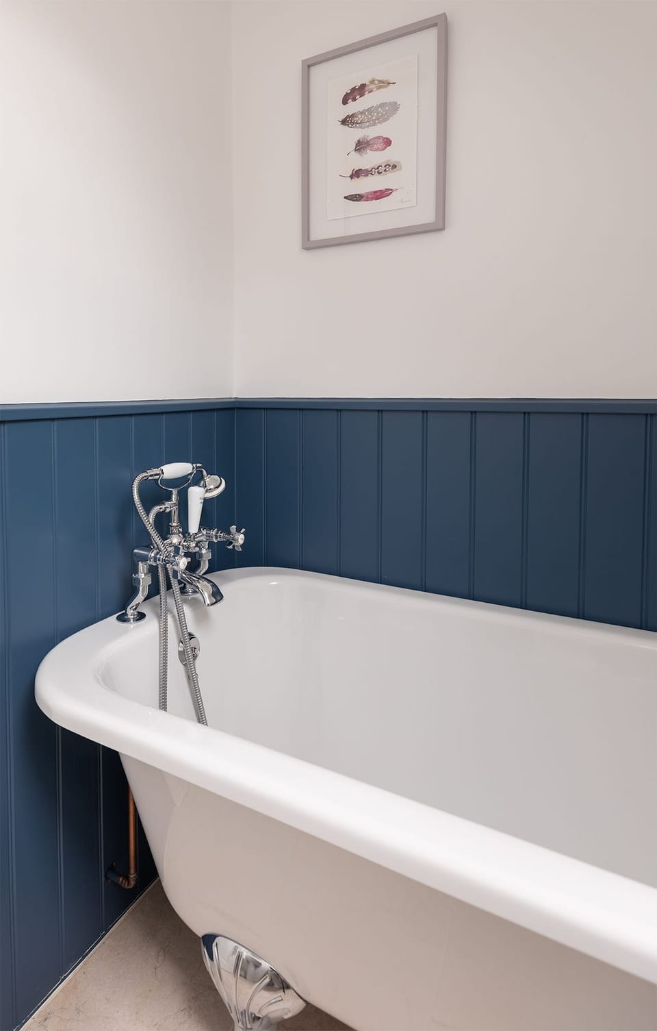The Wheel House - bedroom one ensuite bathroom with bath with shower over