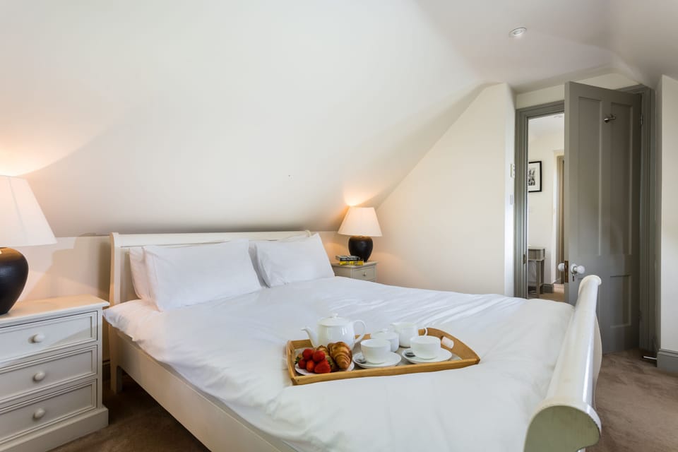 Relax with breakfast in bed in bedroom one