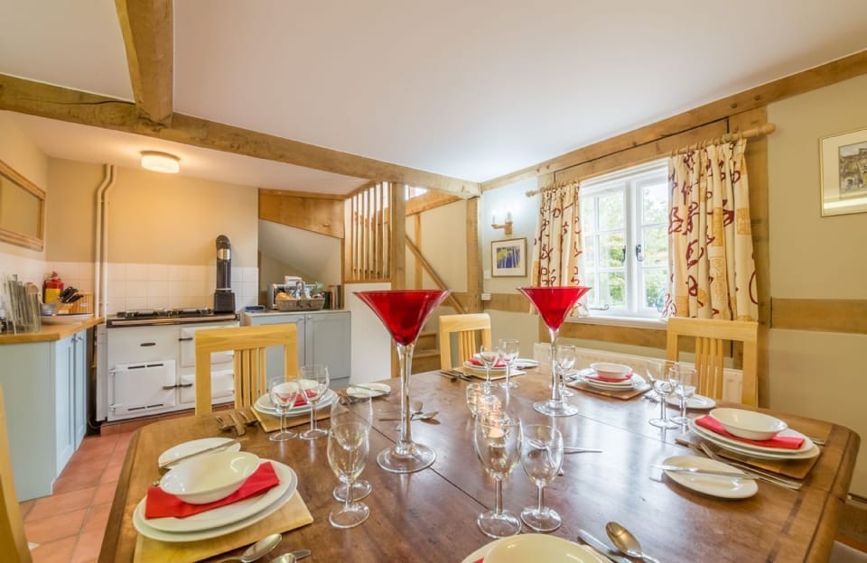 Ground floor: Farmhouse kitchen with Rayburn and dining table
