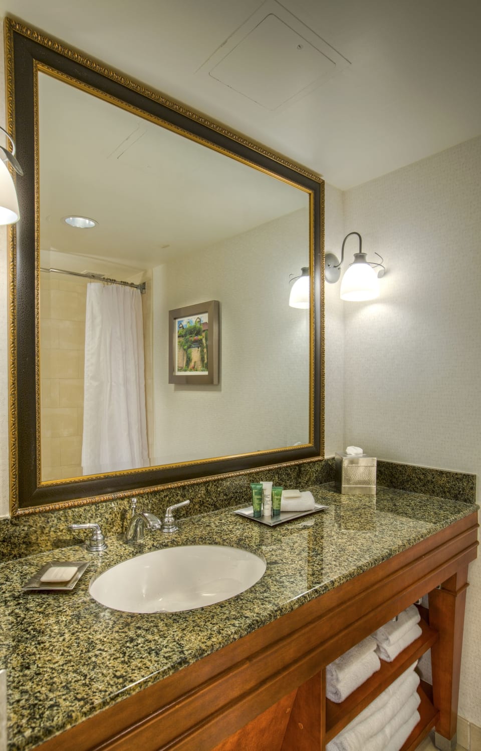 Designer toiletries, hair dryer, towels, soap