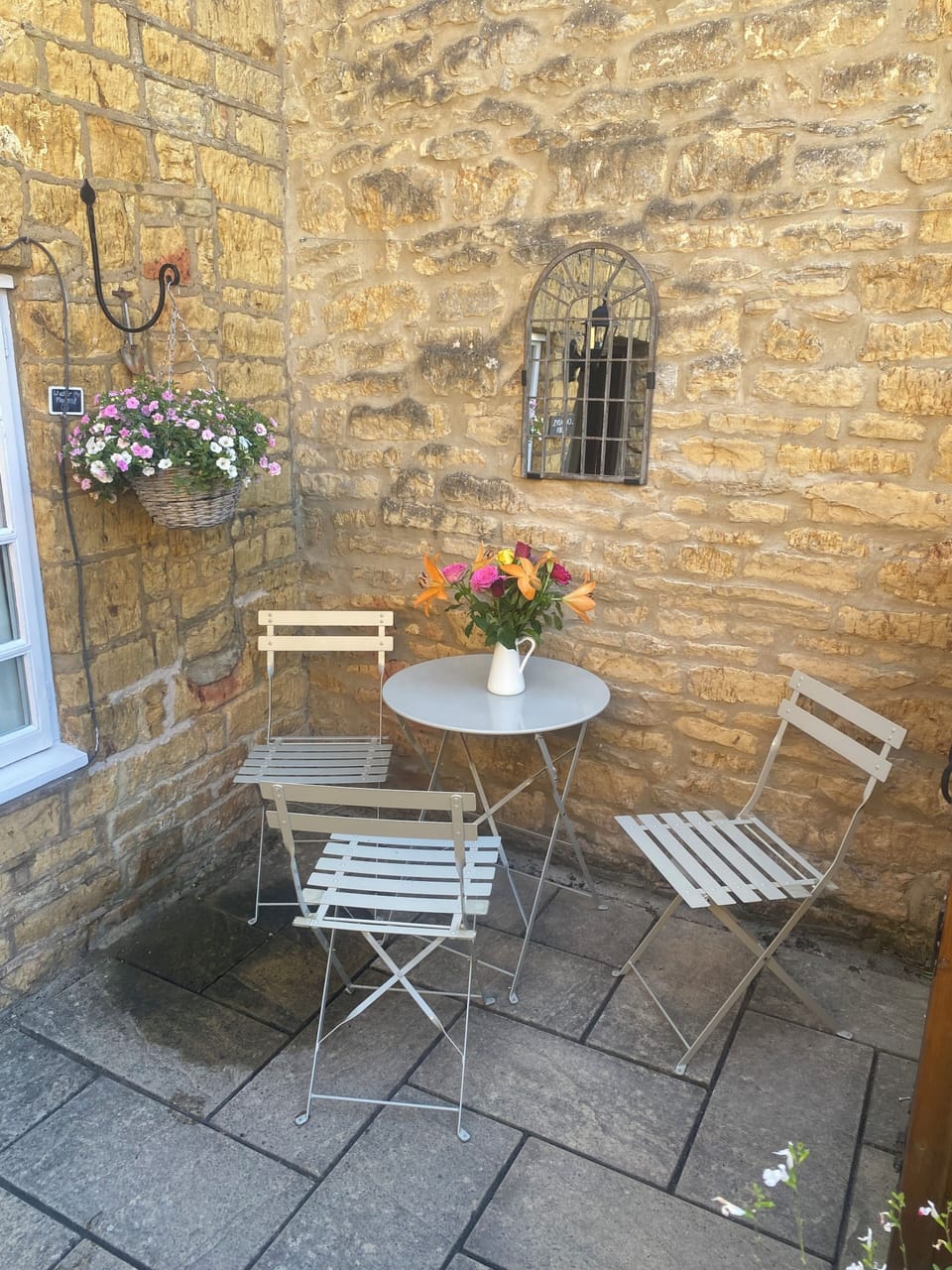 Courtyard seating for three