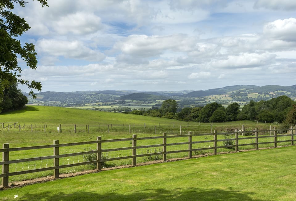 Wassell Barn sits on the west side of the Downton Estate, in an elevated position overlooking the Welsh hills
