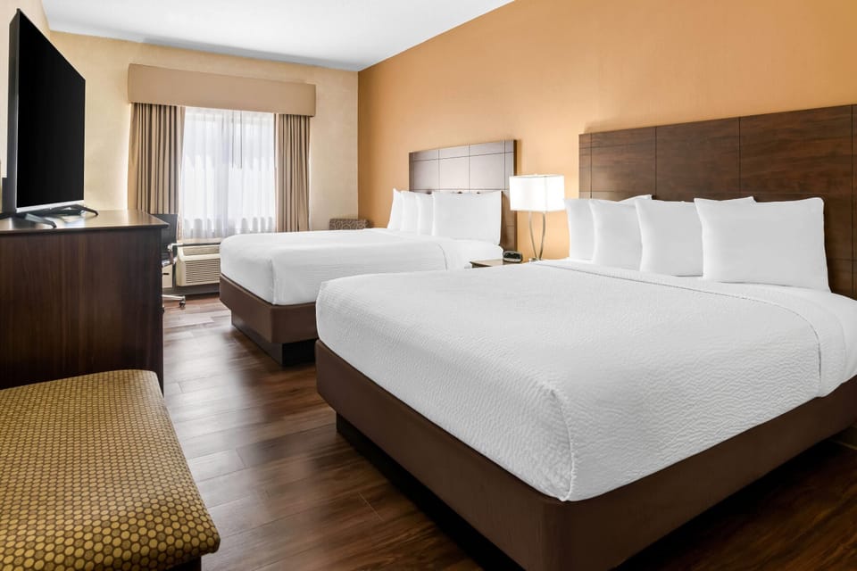 Standard Room, 2 Queen Beds | Desk, laptop workspace, blackout drapes, iron/ironing board