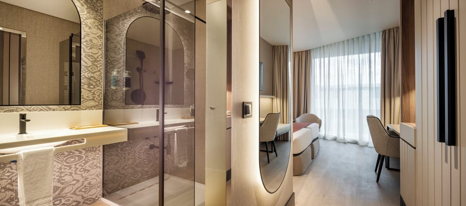 Premium Double Room | Bathroom | Combined shower/tub, deep soaking tub, eco-friendly toiletries