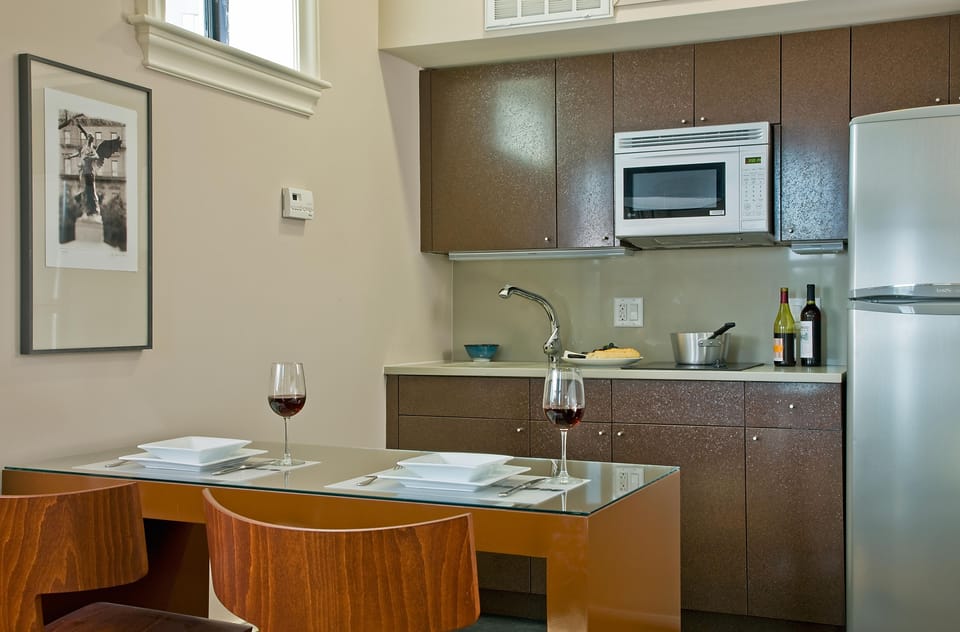 Full-size fridge, microwave, stovetop, coffee/tea maker