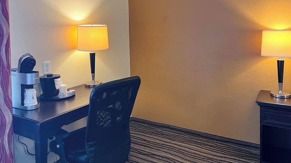 Desk, blackout drapes, iron/ironing board, free WiFi