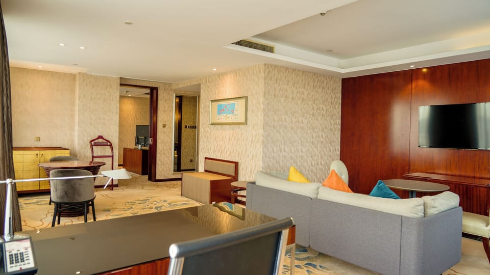 Suite, 1 Bedroom (Dining, High Floor) | Premium bedding, down comforters, pillowtop beds, minibar
