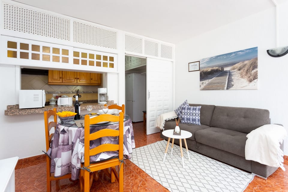 Living and dining area with sofabed