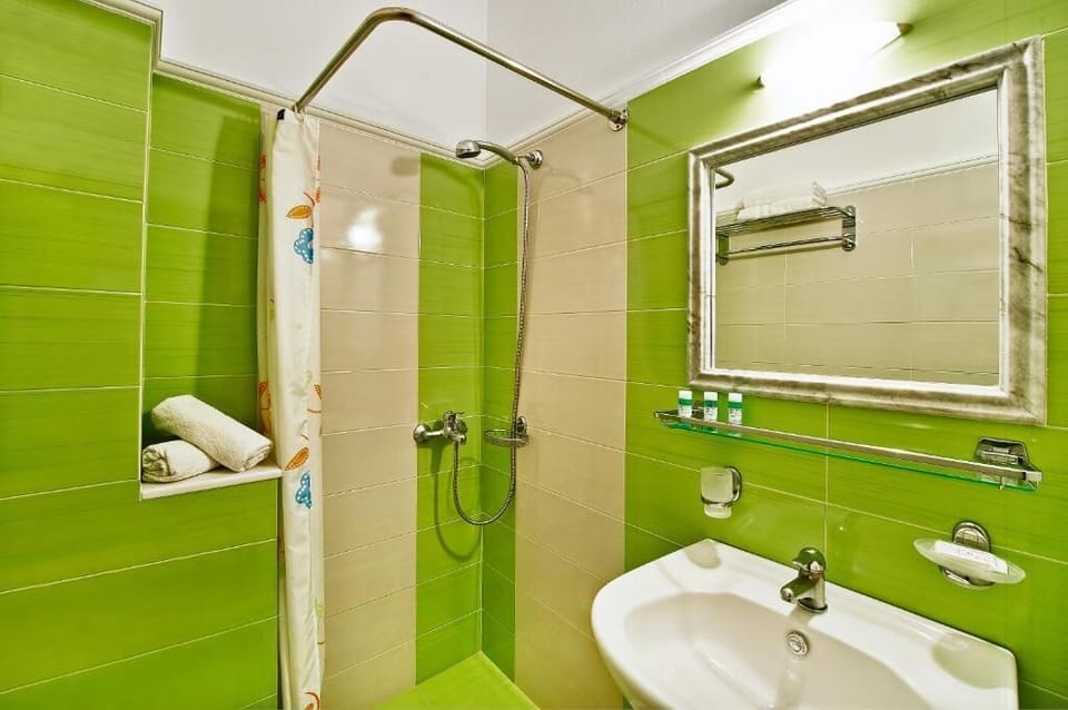 Economy Double Room , Semi Basement | Bathroom | Hair dryer, towels
