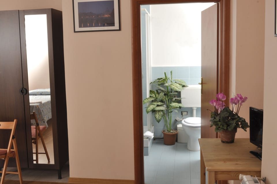 Triple Room, Private Bathroom | Down comforters, minibar, blackout drapes, soundproofing