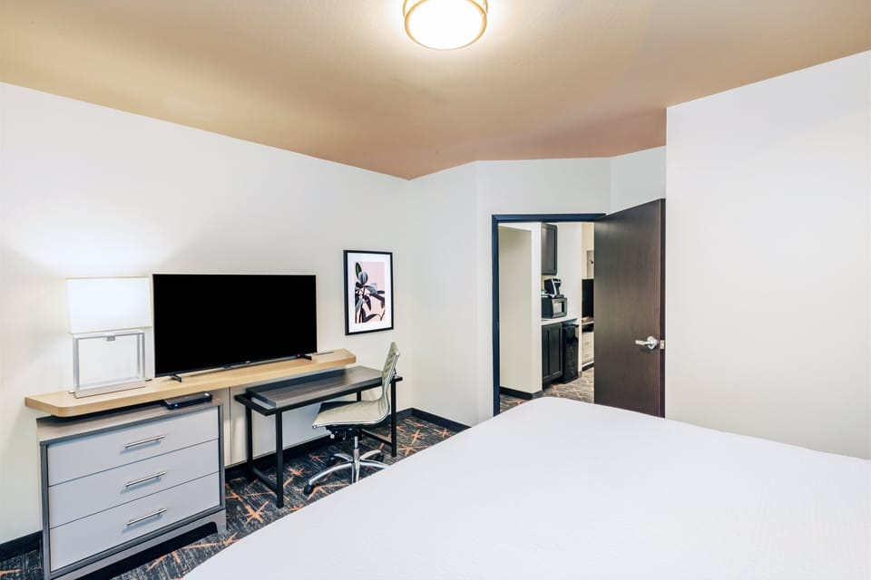 Desk, laptop workspace, blackout drapes, soundproofing