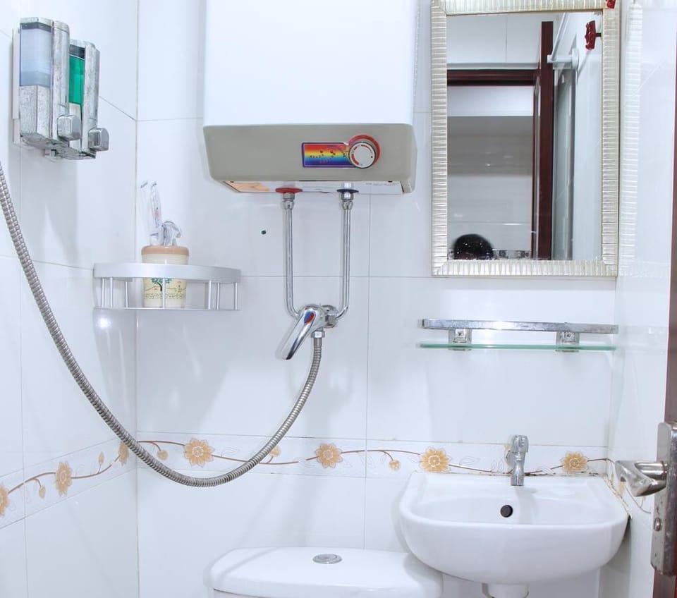 Shower, free toiletries, hair dryer, slippers