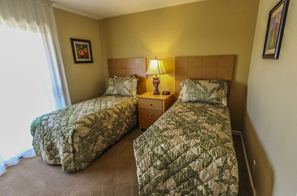 Family Condo, 2 Bedrooms | 2 bedrooms, blackout drapes, iron/ironing board, free WiFi