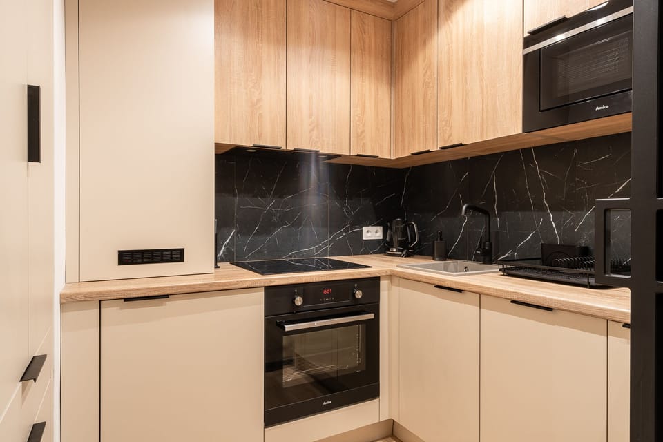 Deluxe Apartment | Private kitchenette | Fridge