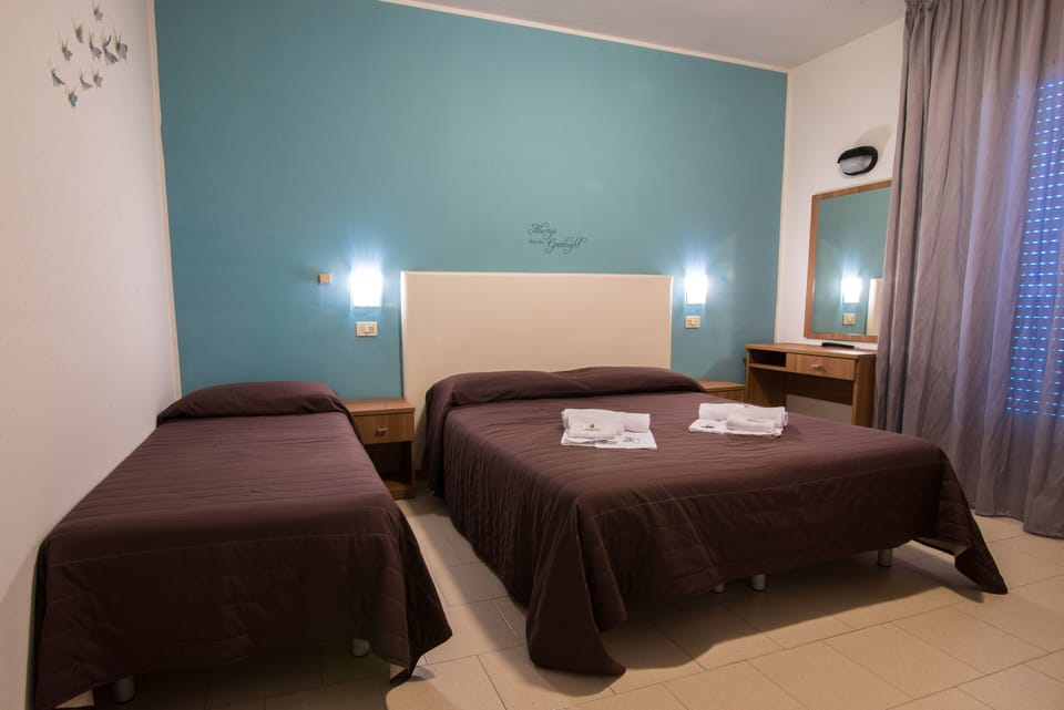Triple Room | In-room safe, desk, cribs (surcharge), rollaway beds (surcharge)