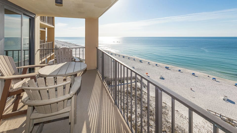 Savor the coastal vibe on your balcony, surrounded by beach views, as you unwind in the refreshing air