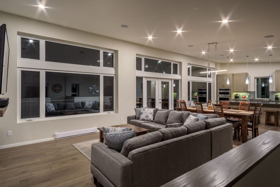The upper floor has access to a huge deck the full length of the home.