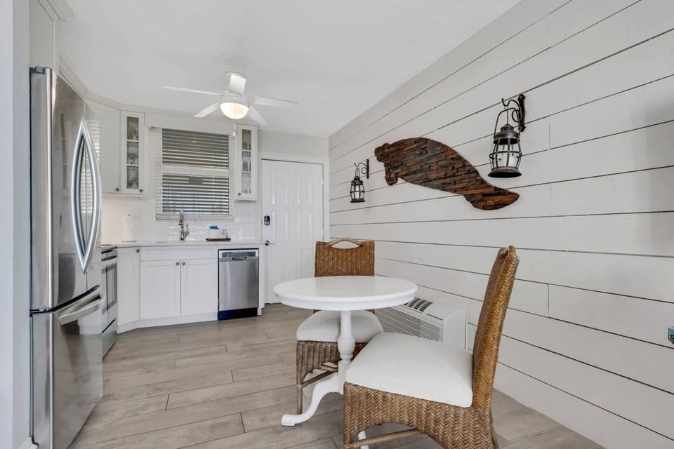 Ceramic wood tile floors, marble counters, tile backsplash, soft close cabinetry, stainless appliances. No design detail was overlooked.