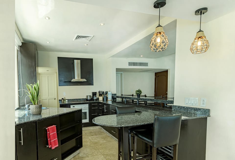 The Full Size Fridge is just beyond the stove, not in the picture here.