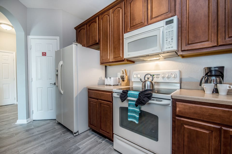 Bright and Airy Culinary Haven: Revel in the natural light that floods our kitchen, creating a bright and airy space for your cooking endeavors