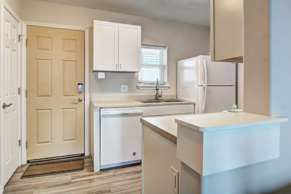Your fully equipped kitchen features everything needed to prepare meals, with modern appliances and plenty of counter space for cooking.