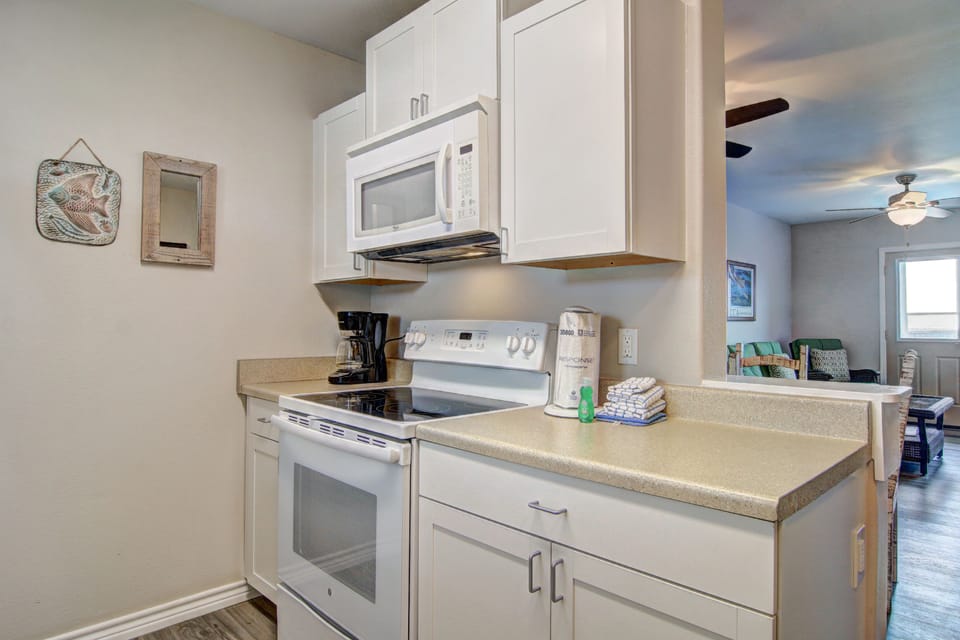 Your fully equipped kitchen features modern appliances and ample counter space for preparing meals during your stay.