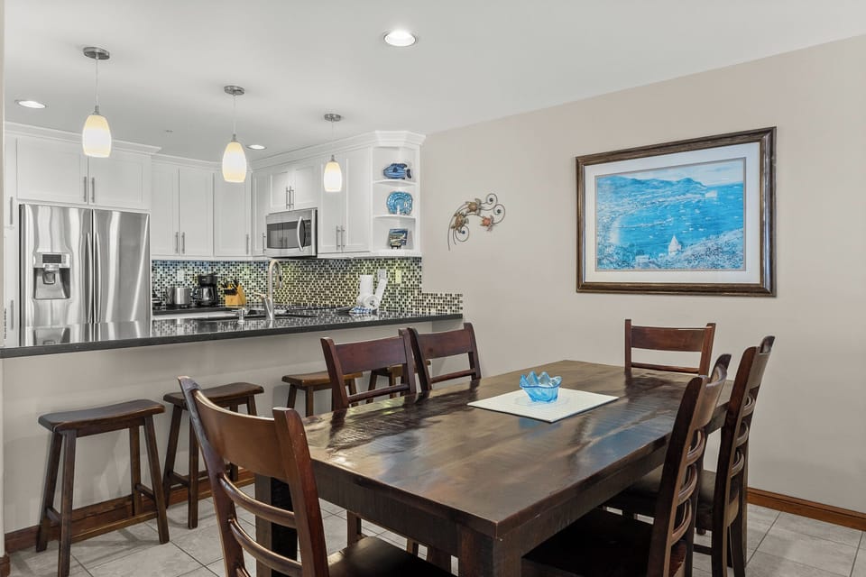 Gather around your spacious dining table for memorable meals while the open kitchen invites you to create culinary adventures together.