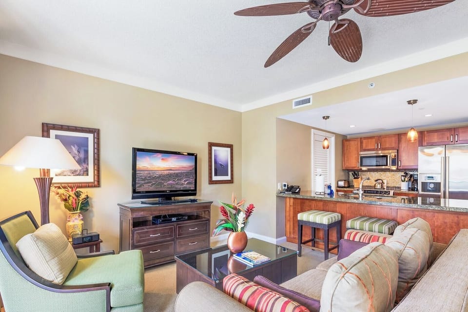 Unwind in this stylish retreat, just steps from the lanai and ocean breeze