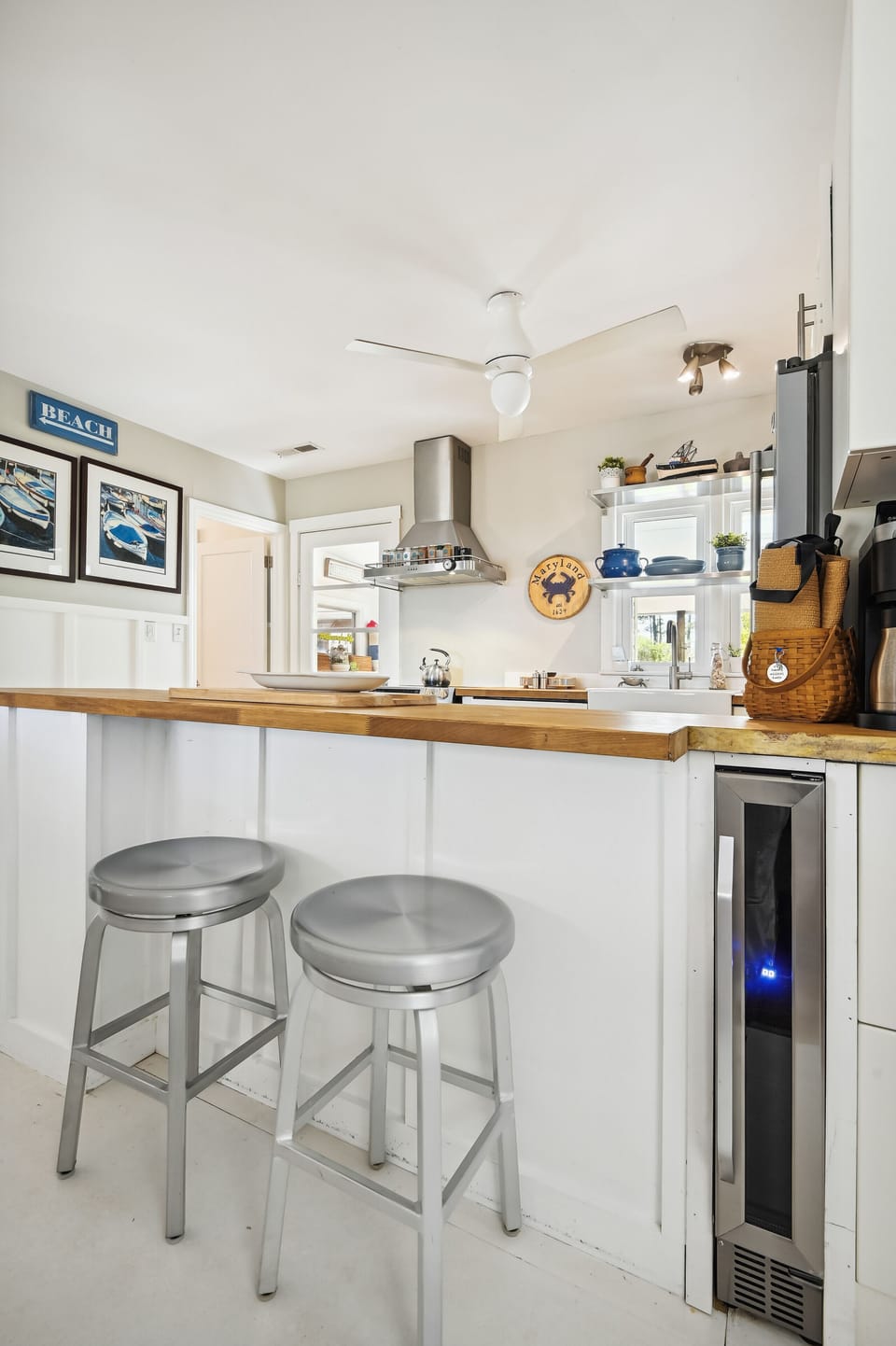 Wine fridge, electric wine bottle opener, kitchen counter seating