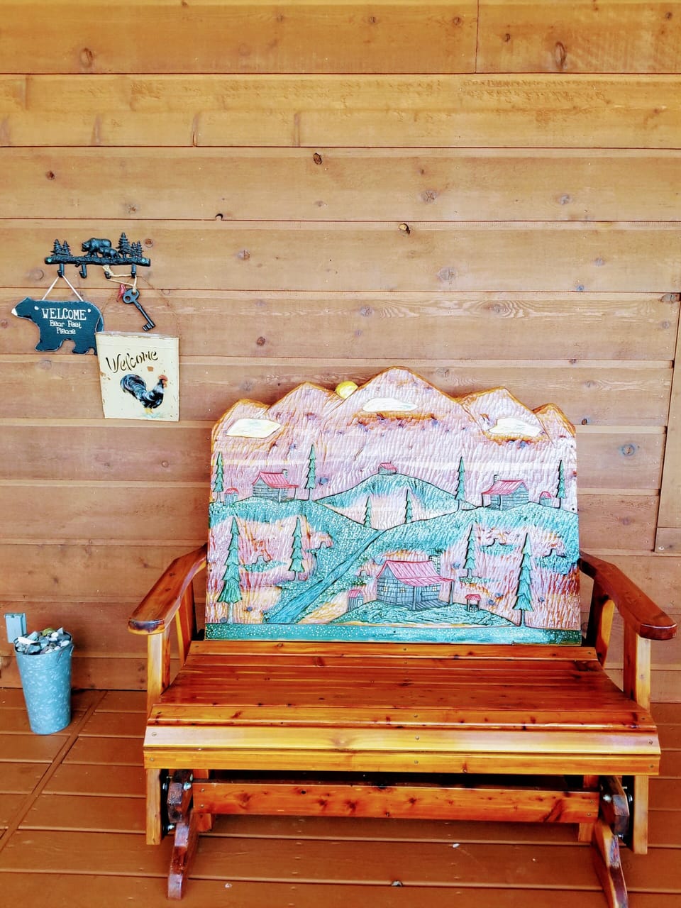 Beautiful locally made hand carved glider on deck. 