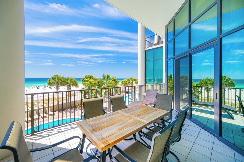 Relax on your balcony, soaking in captivating views of the coast while enjoying the gentle sounds of the waves